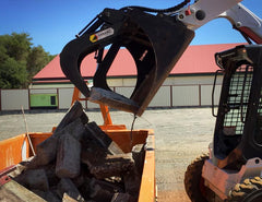 Grapple arms allow precise picking with your Skid Steer